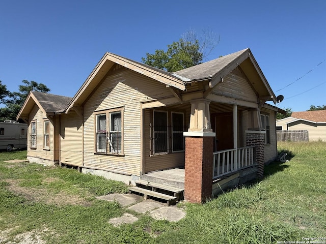 918 Potomac, San Antonio, TX 78202 - view of side of property with a yard and covered porch