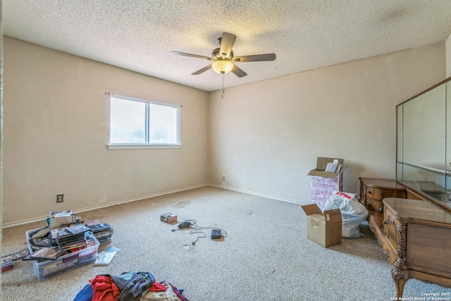 2102 Border Ml, San Antonio, TX 78230 - spare room with a ceiling fan, a textured ceiling, and carpet floors