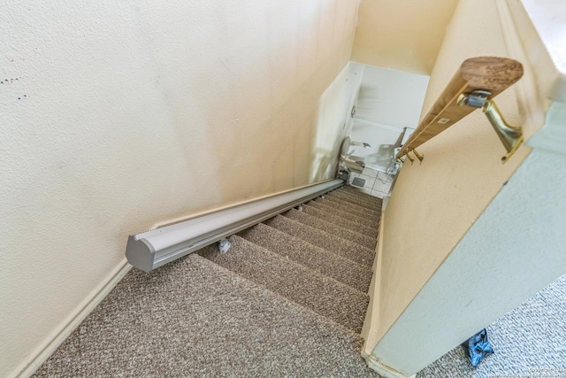 2102 Border Ml, San Antonio, TX 78230 - stairs with carpet flooring and a textured wall