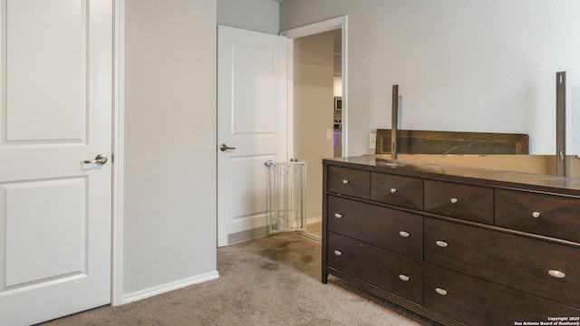 7207 Rosada Way, San Antonio, TX 78218 - bedroom featuring light colored carpet and baseboards