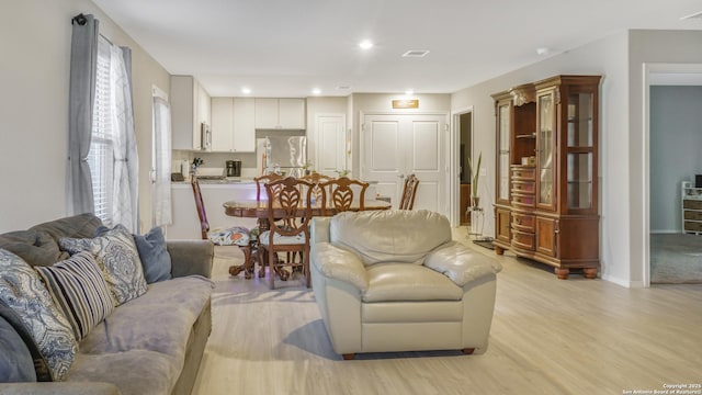 7207 Rosada Way, San Antonio, TX 78218 - living area with light wood finished floors and recessed lighting