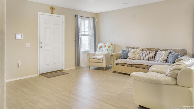 7207 Rosada Way, San Antonio, TX 78218 - living area featuring light wood finished floors
