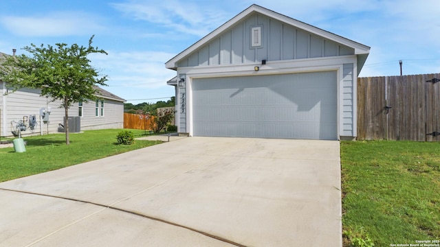 7207 Rosada Way, San Antonio, TX 78218 - view of front facade featuring board and batten siding, a garage, and an outbuilding