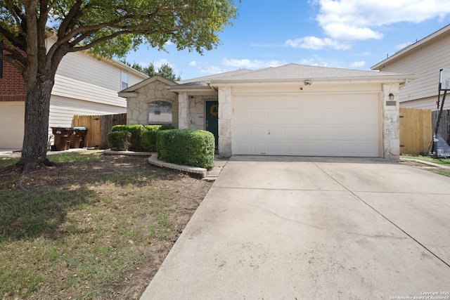 10410 Appaloosa Bay, San Antonio, TX 78254 - ranch-style house featuring stone siding, an attached garage, and concrete driveway