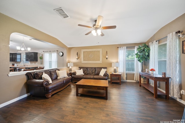 10410 Appaloosa Bay, San Antonio, TX 78254 - living area with lofted ceiling, a ceiling fan, dark wood-style floors, and arched walkways