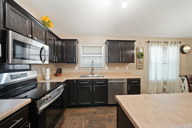10410 Appaloosa Bay, San Antonio, TX 78254 - kitchen with appliances with stainless steel finishes, dark wood-style floors, and light countertops