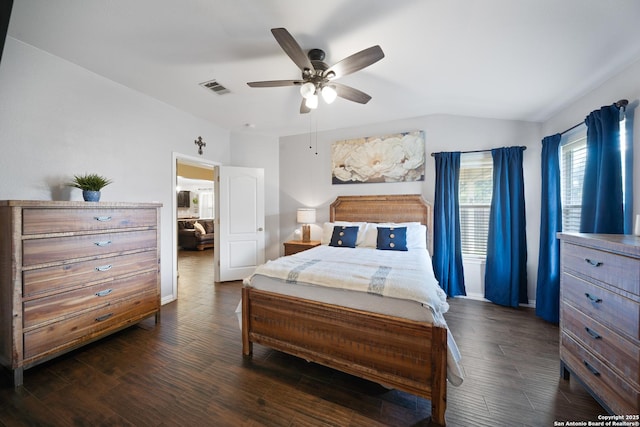10410 Appaloosa Bay, San Antonio, TX 78254 - bedroom featuring dark wood-style flooring, vaulted ceiling, and a ceiling fan