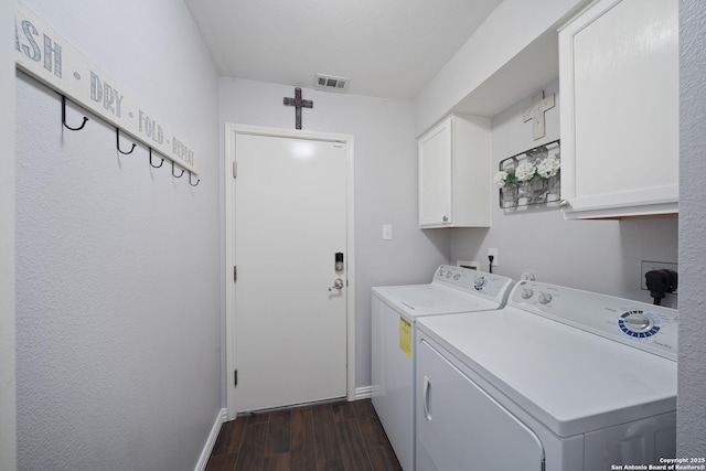10410 Appaloosa Bay, San Antonio, TX 78254 - washroom with independent washer and dryer, cabinet space, and dark wood finished floors