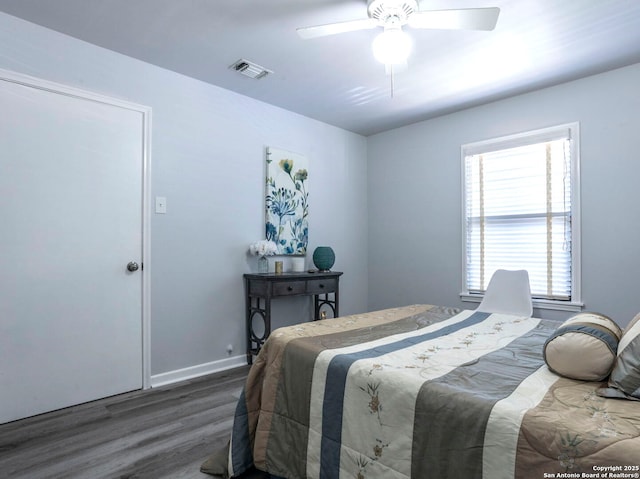 131 Hartford, San Antonio, TX 78223 - bedroom with wood finished floors and ceiling fan