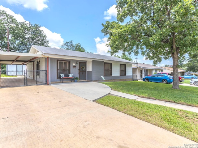 131 Hartford, San Antonio, TX 78223 - ranch-style house featuring a gate, driveway, and an attached carport