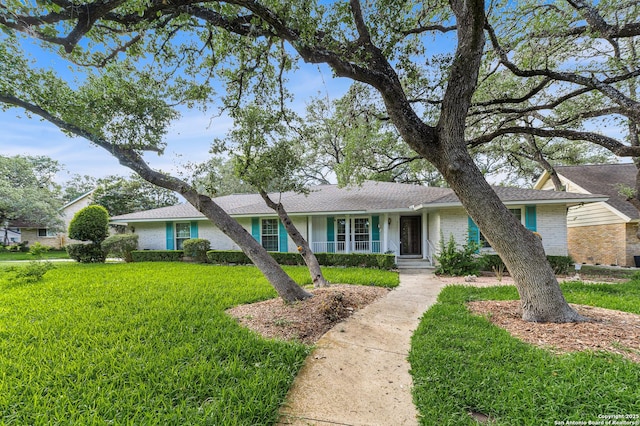 3523 Red Oak, San Antonio, TX 78230 - ranch-style house featuring a front yard, brick siding, and a shingled roof