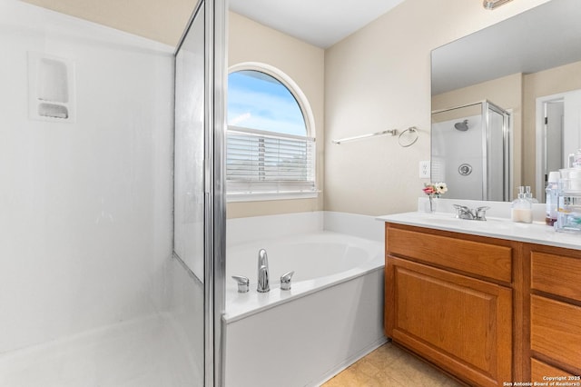 10223 Cactus Vly, San Antonio, TX 78254 - bathroom featuring vanity, a shower stall, and a garden tub