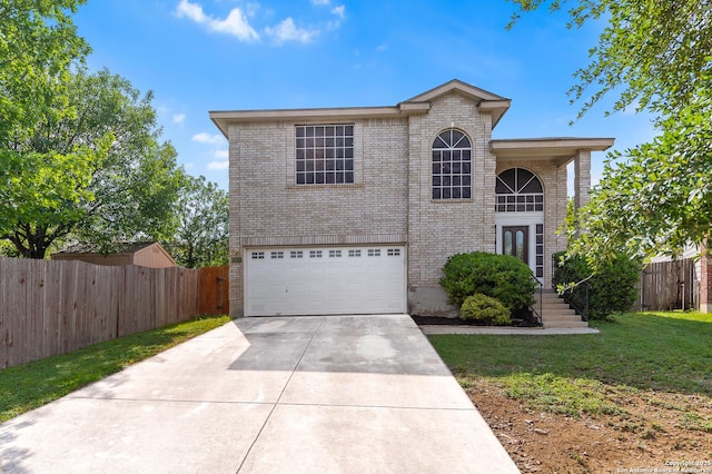 10223 Cactus Vly, San Antonio, TX 78254 - traditional-style home featuring concrete driveway, brick siding, and an attached garage