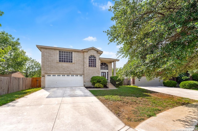 10223 Cactus Vly, San Antonio, TX 78254 - traditional-style home featuring driveway, an attached garage, and brick siding