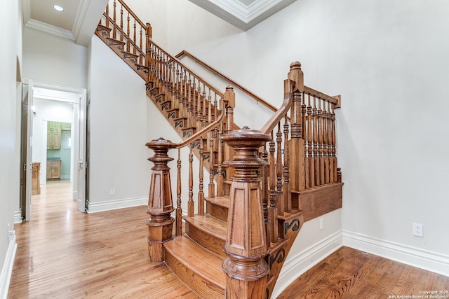600 Thelma, Olmos Park, TX 78212 - stairway with crown molding and wood finished floors