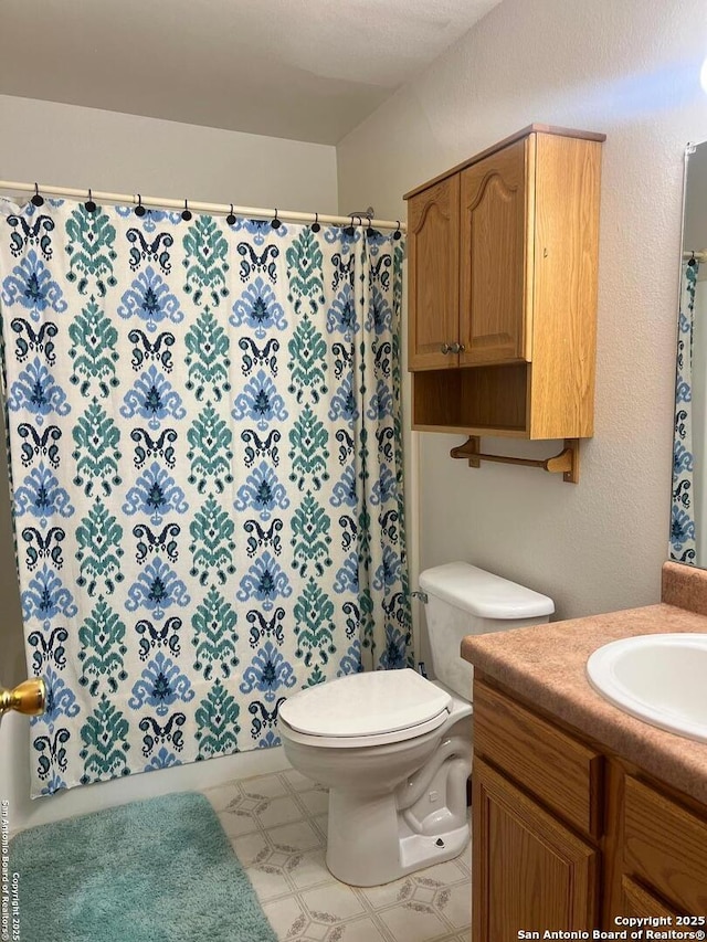 1503 Jami, Pleasanton, TX 78064 - bathroom with vanity, curtained shower, and tile patterned floors