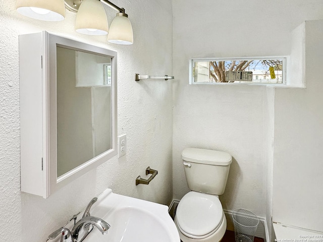 102 Aganier Ave, San Antonio, TX 78212 - half bath with toilet and a textured wall