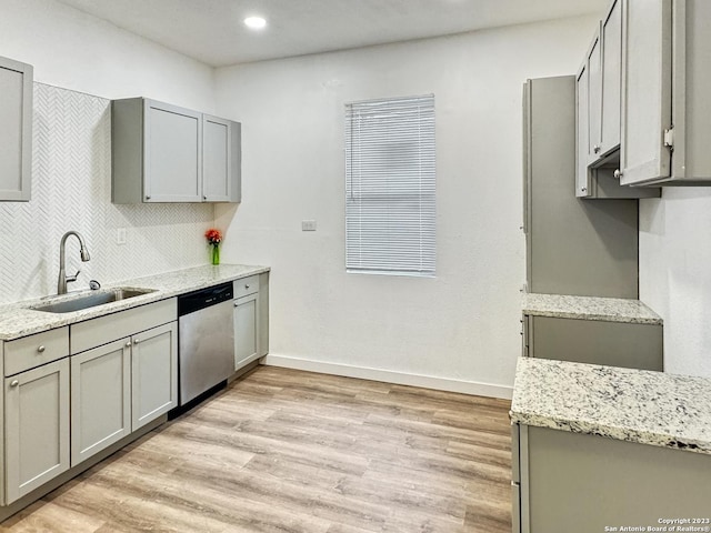 102 Aganier Ave, San Antonio, TX 78212 - kitchen with dishwasher, gray cabinets, light stone countertops, light wood-type flooring, and recessed lighting
