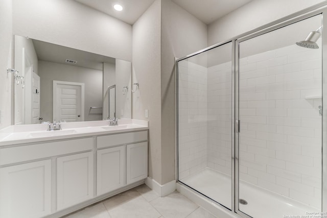 29125 Rock Cyn, Bulverde, TX 78163 - full bathroom with a shower stall, tile patterned flooring, and double vanity