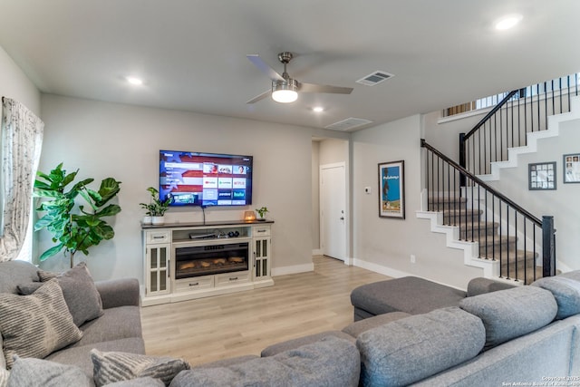 29125 Rock Cyn, Bulverde, TX 78163 - living area featuring stairway, wood finished floors, ceiling fan, and recessed lighting