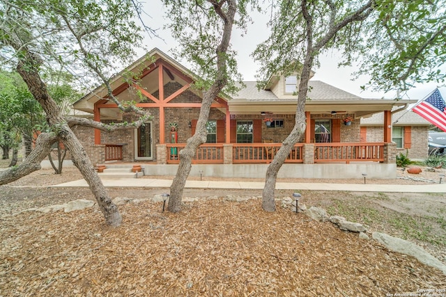 1777 Crossbow, Canyon Lake, TX 78133 - back of property with brick siding and covered porch