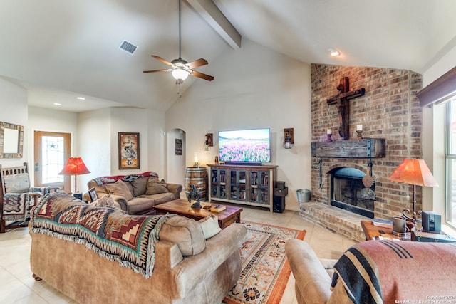 1777 Crossbow, Canyon Lake, TX 78133 - tiled living area featuring arched walkways, beam ceiling, ceiling fan, high vaulted ceiling, and recessed lighting