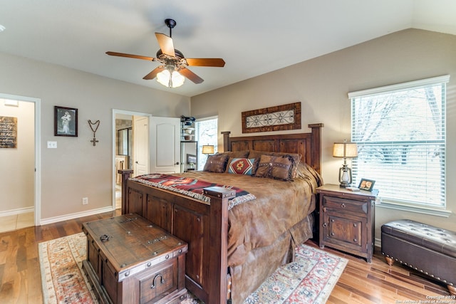 1777 Crossbow, Canyon Lake, TX 78133 - bedroom with wood finished floors, ceiling fan, and ensuite bathroom