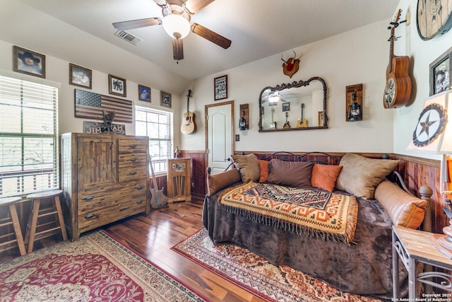 1777 Crossbow, Canyon Lake, TX 78133 - living area featuring hardwood / wood-style floors, ceiling fan, wainscoting, and lofted ceiling