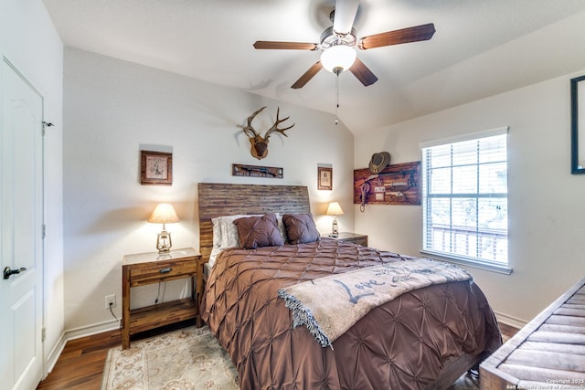 1777 Crossbow, Canyon Lake, TX 78133 - bedroom featuring wood finished floors, vaulted ceiling, and a ceiling fan