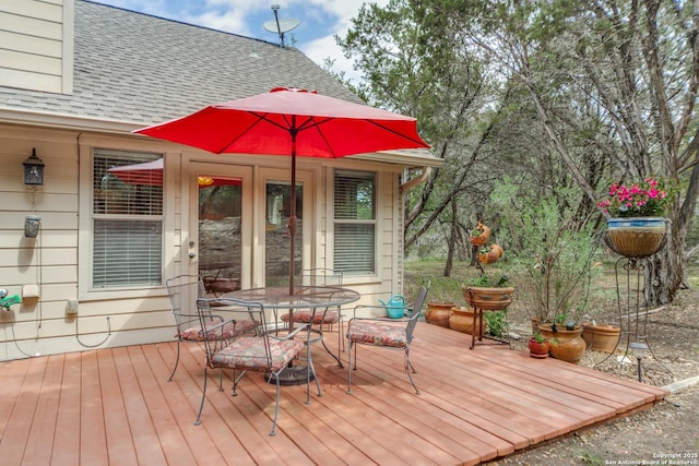 1777 Crossbow, Canyon Lake, TX 78133 - wooden deck featuring outdoor dining space