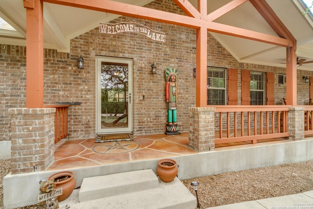 1777 Crossbow, Canyon Lake, TX 78133 - property entrance featuring covered porch and brick siding