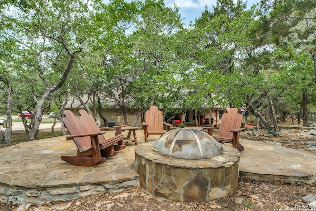 1777 Crossbow, Canyon Lake, TX 78133 - view of patio / terrace featuring a fire pit