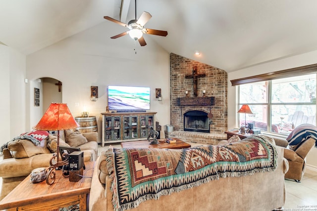 1777 Crossbow, Canyon Lake, TX 78133 - living room featuring ceiling fan, high vaulted ceiling, tile patterned floors, and arched walkways