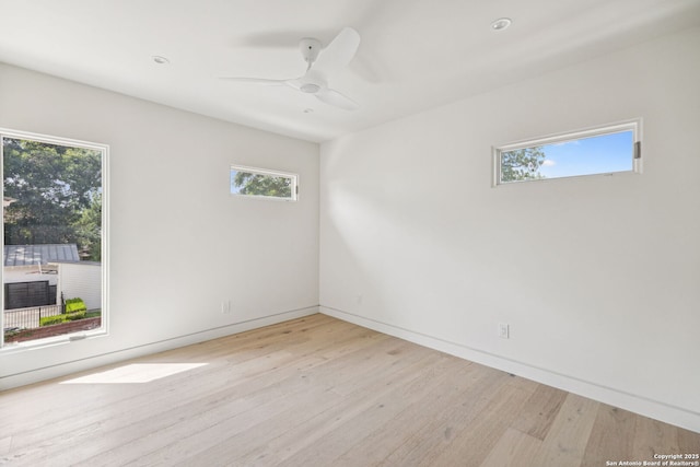 305 Joliet Unit D, San Antonio, TX 78209 - unfurnished room featuring wood finished floors and ceiling fan