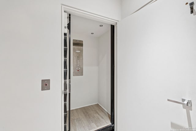 305 Joliet Unit D, San Antonio, TX 78209 - hall with elevator and light wood-type flooring
