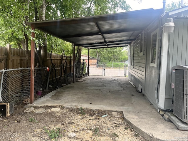 503 Grosvenor, San Antonio, TX 78221 - view of parking featuring an attached carport