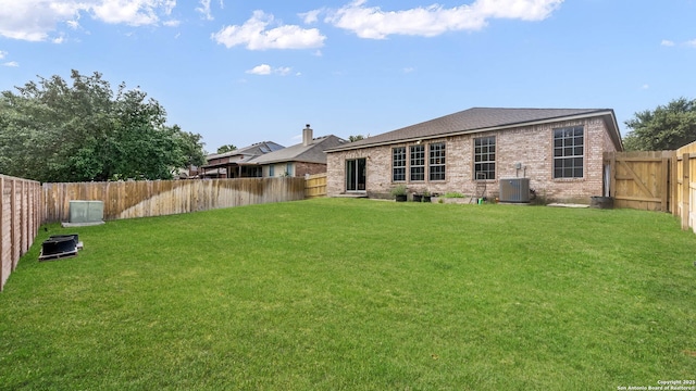 8023 Jalane Oaks, San Antonio, TX 78255 - back of house featuring brick siding and a fenced backyard
