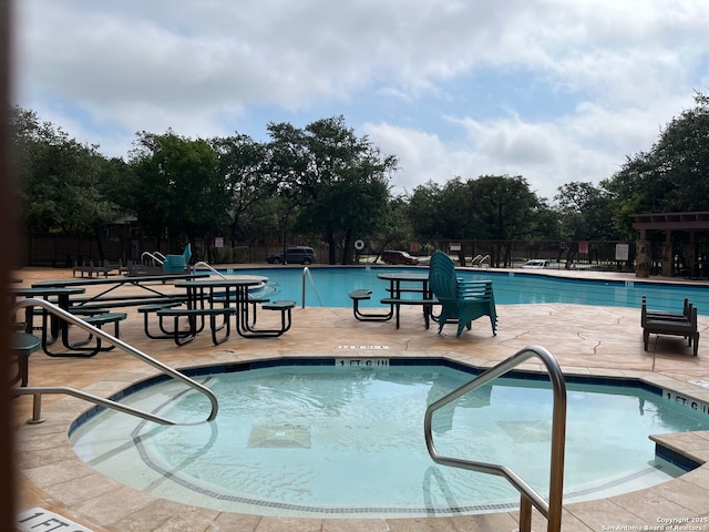 8023 Jalane Oaks, San Antonio, TX 78255 - community pool featuring a patio