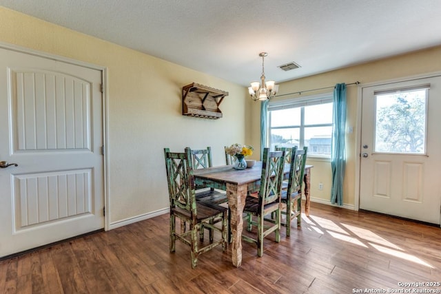 812 Riviere, Falls City, TX 78113 - dining space with a chandelier and wood finished floors