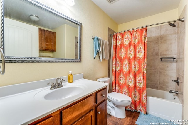 812 Riviere, Falls City, TX 78113 - bathroom featuring vanity, shower / tub combo, and wood finished floors