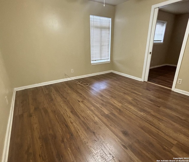 806 Ceralvo, San Antonio, TX 78207 - spare room with dark wood finished floors and baseboards