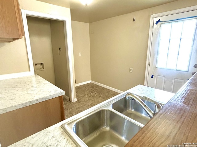 806 Ceralvo, San Antonio, TX 78207 - kitchen featuring light countertops and brown cabinets