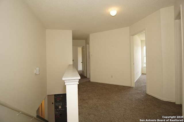 5615 Camry Spgs, San Antonio, TX 78251 - carpeted empty room featuring a textured ceiling