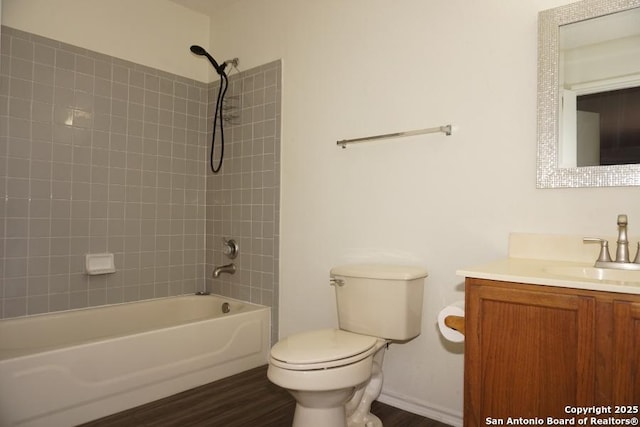 5615 Camry Spgs, San Antonio, TX 78251 - bathroom with vanity, shower / bathtub combination, and wood finished floors