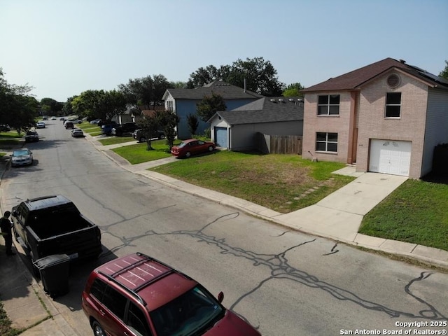 5615 Camry Spgs, San Antonio, TX 78251 - view of front of house with a garage, a front lawn, and driveway