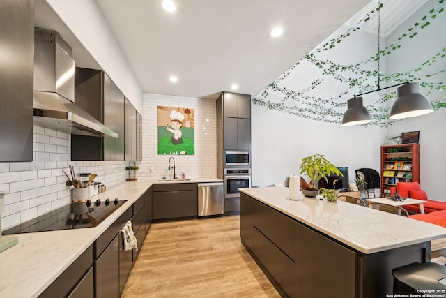 818 Martin Luther King, San Antonio, TX 78203 - kitchen featuring stainless steel appliances, wall chimney exhaust hood, modern cabinets, tasteful backsplash, and a center island