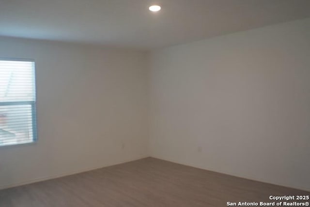 7119 Satellite Way, San Antonio, TX 78252 - spare room with wood finished floors and recessed lighting