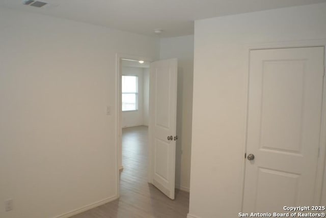 7119 Satellite Way, San Antonio, TX 78252 - hall featuring light wood-type flooring and baseboards