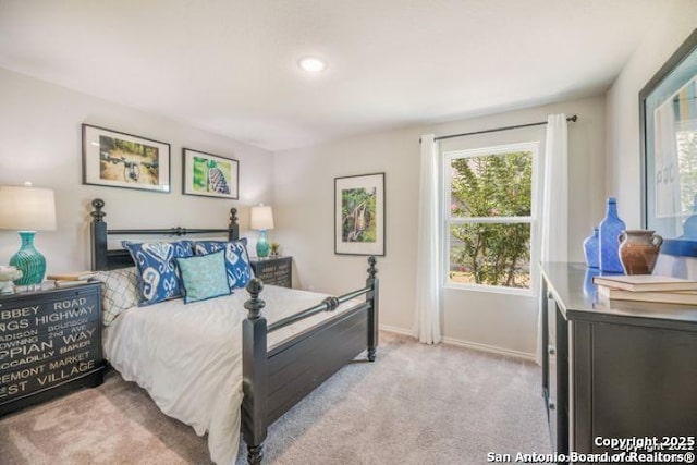 212 Agave Cir, Jourdanton, TX 78026 - carpeted bedroom with baseboards and recessed lighting
