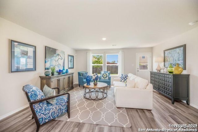 212 Agave Cir, Jourdanton, TX 78026 - living area with wood finished floors and recessed lighting